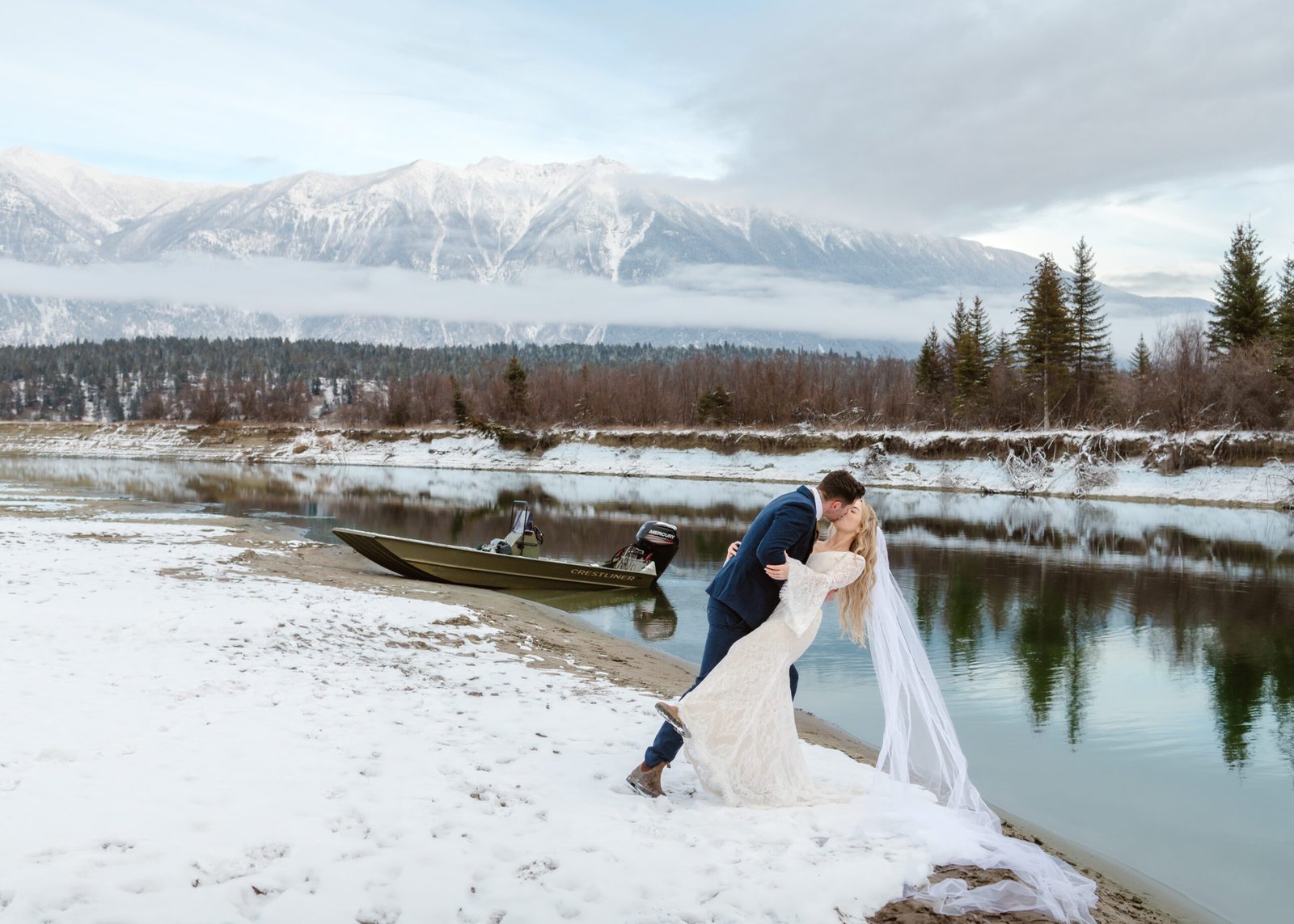 Cranbrook photographer Estelle jetboat elopement experience in the rockies. Cranbrook BC Estelle Gonord