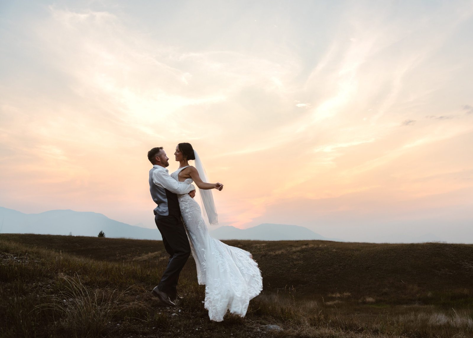 bride and groom at sunset