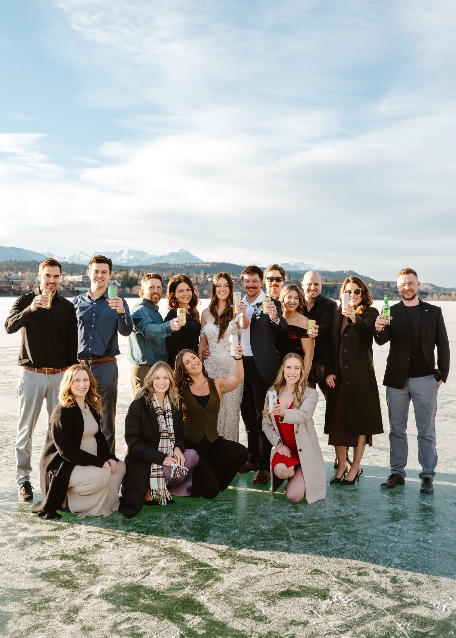bride and groom on invermere bc frozen lake during valentine's day